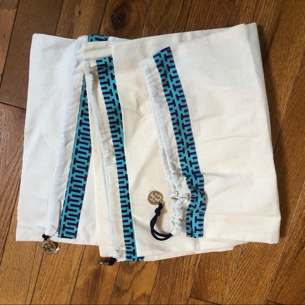 Three Tory Burch shoe bags